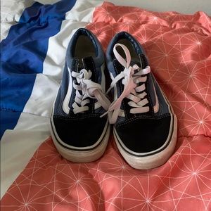 Low top blue, black, and white vans